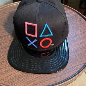 Black PlayStation Bioworld adjustable hat with imitation leather brim
